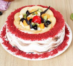 Red Velvet Fruit Cake - A luscious dessert with vibrant red hues, combining velvety texture with fruity accents for a delightful treat.