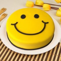 Smiley Chocolate Cake: A delightful treat adorned with smiley faces, perfect for spreading joy at any celebration or occasion.