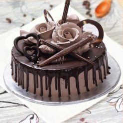 Designer Rose Chocolate Cake: A decadent creation adorned with intricate rose designs, combining floral elegance with rich chocolate flavor.