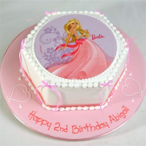 Barbie photo cake, a whimsical confectionary creation perfect for birthday celebrations and special occasions, delighting children and guests.