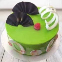 Kiwi designer cake, a unique fusion of fresh kiwi flavor and artistic design, perfect for adding a touch of exotic flair.