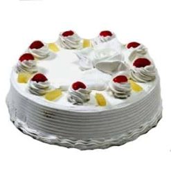 Pineapple cake with white flowers decorated