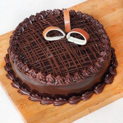 A slice of Decent Chocolate Cake, featuring moist layers of rich chocolate, perfect for dessert lovers and special occasions.