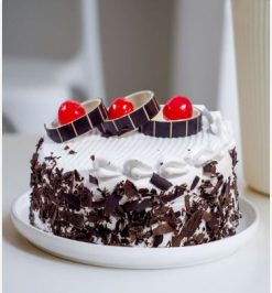 A modern twist on the classic Black Forest cake, featuring rich chocolate, fluffy cream, and tangy cherries, perfect for dessert lovers.