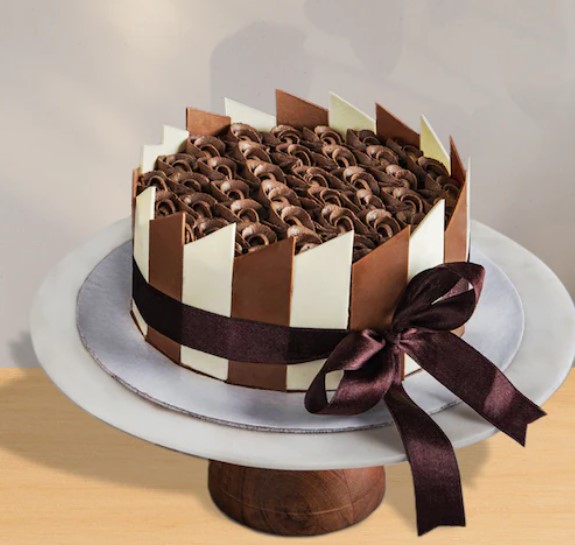 Premium Vector | Birthday cake vector background design. happy birthday  greeting text with yummy cake element