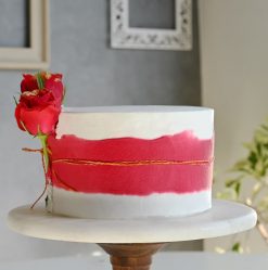 Red Rose Pineapple Cake: A delightful combination of tropical pineapple flavors and elegant red rose decoration, perfect for special occasions."