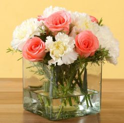 Pink Roses With White Carnations Vase, a stunning floral arrangement perfect for adding elegance and beauty to any space.