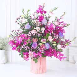 Carnation Blush Medley bouquet in various shades of pink, perfect for expressing warmth and affection on any occasion.