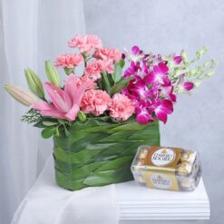 Carnation Bliss and Chocolate Delight Combo: A refreshing and delightful gift combination perfect for any occasion.