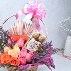 Chocolate and Roses Delight Basket: A delightful combination of chocolates and roses, perfect for gifting on any occasion.