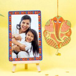 Customized Frame with Vibrant Ganesha Hanging: Add color and spirituality to your home decor with this personalized combination.