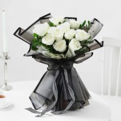 Enchanted Noir Rose Ensemble: A captivating bouquet of monochrome magic roses, perfect for adding elegance to any occasion.