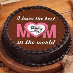 A cake adorned with cherished memories, perfect for celebrating Mom's special day with love and sentimentality.