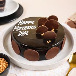 A graceful truffle cake, perfect for celebrating Mom in elegance and style on Mother's Day.