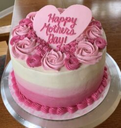 An elegantly designed floral ombre cake, perfect for celebrating Mom's special day with style and grace.