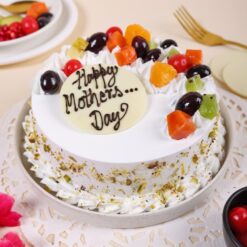 A heavenly vanilla fruit cake, a divine treat to celebrate Mom on Mother's Day with its delightful flavors.