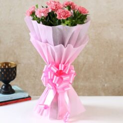 Eight pink carnations bouquet wrapped in Pink Plain Non Woven Paper Packing