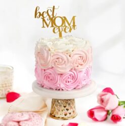 A delightful pink ombre cake, a tribute to Mom's love and devotion on any special occasion.