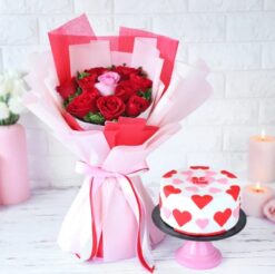 Playful Romance Floral Bunch with Cake - Pink roses and assorted flowers arranged beautifully with a delicious cake, perfect for gifting.