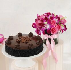 Roses and Orchids Bouquet with Truffle Treat Cake - A delightful combination for any occasion.