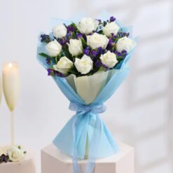 Beautiful bouquet of white roses, symbolizing purity and elegance, perfect for weddings, anniversaries, and special occasions.