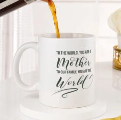 Personalized mug with 'Mom's World' design, perfect for gifting. Customize yours for a special touch.
