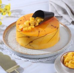 Mango cream cake, a delicious dessert perfect for indulging in creamy mango flavors on any occasion.