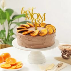 Mom's Zesty Chocolate Delight Cake - A delightful fusion of citrus and chocolate flavors, perfect for sweetening her special day.