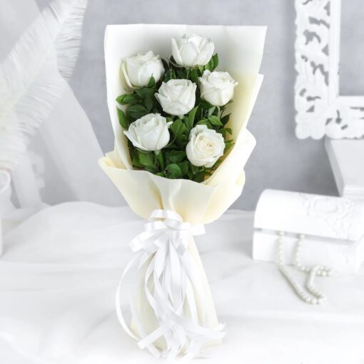Pure Serenity White Rose Bouquet: Six pristine white roses exuding elegance and grace, perfect for conveying tranquility and purity.