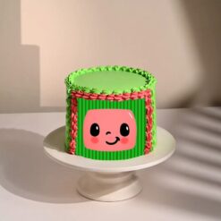 Adorable Cocomelon cake with colorful decorations, ideal for birthdays and celebrations, inspired by the popular children's show.