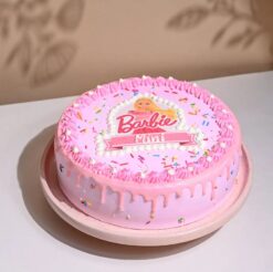 Beautiful Barbie cake with intricate decorations, ideal for birthdays and celebrations for fans of the iconic doll.