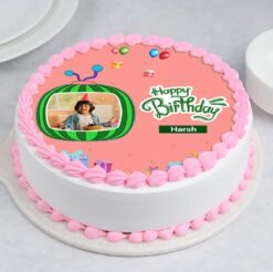 Coco Melon theme strawberry cake with colorful decorations, ideal for birthdays and celebrations inspired by the popular children's show.