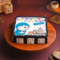 "Doraemon Photo Cake" - A cake decorated with Doraemon-themed elements