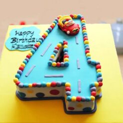 Elegant fondant number cake with decorative icing, ideal for birthdays and celebrations.