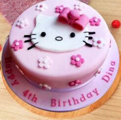 Hello Kitty fondant cake with iconic bow and features, ideal for birthdays and celebrations for fans of the beloved character.