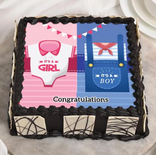It's a boy girl baby shower cake with colorful design, ideal for celebrating the arrival of twins or a surprise gender reveal.