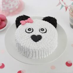 Monochrome teddy bear cake with black and white icing, ideal for special occasions and celebrations.