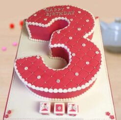 Number fondant cake decorated with colorful icing, ideal for birthdays and special occasions.