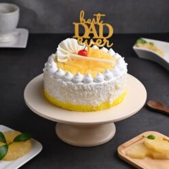 Tropical pineapple cream cake, perfect for celebrating Dad's special day and tropical fruit enthusiasts.