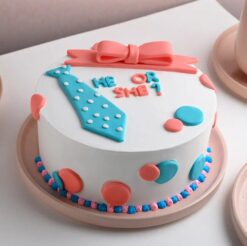Surprise baby shower cake with festive design, perfect for celebrating the arrival of a new bundle of joy.