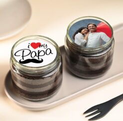 Personalized jar cakes with delightful decorations, made by Sweet Papa's for special occasions and gifts.