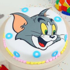 Tom fondant cake with cartoon character design, ideal for birthdays and celebrations for fans of the iconic cat.